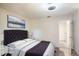 Staged bedroom with a plush headboard and soft rug at 6475 23Rd N St, St Petersburg, FL 33702