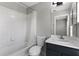 Bathroom featuring a shower-tub combo, toilet, and vanity with mirror at 6709 Lake Rochester Ln, Gibsonton, FL 33534