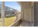 Enclosed lanai featuring concrete floor and view of building exterior at 6709 Lake Rochester Ln, Gibsonton, FL 33534