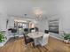 Modern dining area open to the kitchen and living spaces at 7910 Sun Island S Dr # 301, South Pasadena, FL 33707