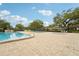 Community amenity showcasing various pools, hot tub, lounge seating and shade at 8419 Laurelon Pl, Temple Terrace, FL 33637