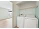 Laundry room area with a washer and dryer at 8419 Laurelon Pl, Temple Terrace, FL 33637