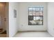 A spacious room featuring neutral walls and a large window at 8419 Laurelon Pl, Temple Terrace, FL 33637