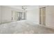View of an empty room featuring a sliding glass door that leads to a lanai at 8419 Laurelon Pl, Temple Terrace, FL 33637