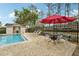 Community pool area featuring a pool and a table with chairs at 8419 Laurelon Pl, Temple Terrace, FL 33637