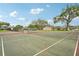 Well-kept outdoor tennis court featuring new nets and a durable playing surface for friendly matches at 8419 Laurelon Pl, Temple Terrace, FL 33637