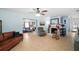 Inviting living room with tile flooring, a fireplace, and a cozy atmosphere at 910 Edgedale Cir, Brandon, FL 33510