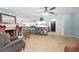 The living room features a fireplace, an open floor plan to the kitchen, and tile flooring at 910 Edgedale Cir, Brandon, FL 33510