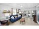 Bright living area with tile flooring, comfortable seating, and ample natural light at 910 Edgedale Cir, Brandon, FL 33510
