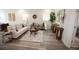 Cozy living room featuring natural light and stylish decor, perfect for relaxation and entertaining at 9445 Eldridge Rd, Spring Hill, FL 34608