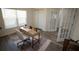 Well-lit home office featuring a desk, comfortable chair, and ample storage space at 9445 Eldridge Rd, Spring Hill, FL 34608