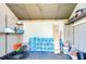 Interior of the shed featuring storage shelves and ample space for organizing equipment at 9826 Island Harbor Dr, Port Richey, FL 34668