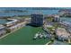 High-rise waterfront condo community featuring boat docks, swimming pool, and tennis courts at 7910 Sun Island S Dr # 301, South Pasadena, FL 33707