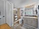 The renovated bathroom includes a glass-enclosed shower, updated vanity, and modern fixtures at 7910 Sun Island S Dr # 301, South Pasadena, FL 33707