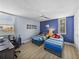 Bedroom boasts hard wood floors, ceiling fan and generous windows with a spectacular view at 7910 Sun Island S Dr # 301, South Pasadena, FL 33707