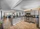 Modern kitchen, with stainless steel appliances, seamlessly connects with living areas at 7910 Sun Island S Dr # 301, South Pasadena, FL 33707