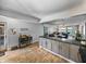 Wide open floor plan offers tile floors and granite counters that seamlessly connect to the living room and gorgeous waterfront view at 7910 Sun Island S Dr # 301, South Pasadena, FL 33707