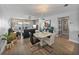 Bright living area with water view, balcony, and modern furnishings; abundant natural light at 7910 Sun Island S Dr # 301, South Pasadena, FL 33707
