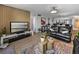 Open-concept living area, filled with natural light, that leads to the kitchen and other living spaces at 7910 Sun Island S Dr # 301, South Pasadena, FL 33707