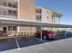 Assigned covered parking spot and manicured landscaping, near the waterfront providing convenience and curb appeal at 7910 Sun Island S Dr # 301, South Pasadena, FL 33707