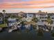 Waterfront home featuring a private dock, stunning views, and easy access to the open water at 104 Carlyle Cir, Palm Harbor, FL 34683
