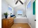 Cozy bedroom nook with natural light, comfortable daybed, and stylish decor at 115 16Th St, Belleair Beach, FL 33786