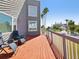 Inviting outdoor deck with comfortable seating and scenic neighborhood views at 115 16Th St, Belleair Beach, FL 33786