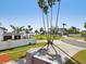Beautiful property showcasing lush landscaping and stunning water views at 115 16Th St, Belleair Beach, FL 33786
