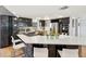 Bright kitchen with a large island, stainless steel appliances, and modern cabinetry for cooking at 115 16Th St, Belleair Beach, FL 33786