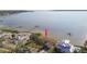 Gorgeous waterfront property featuring a private dock and stunning bay views, perfect for serene coastal living at 116 Shore Drive Pl, Oldsmar, FL 34677
