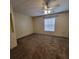 Bedroom with neutral carpet, ceiling fan, one window and cream walls at 12760 Indian Rocks Rd # 540, Largo, FL 33774