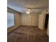 Bedroom featuring carpeting, ceiling fan, window, cream walls and closet at 12760 Indian Rocks Rd # 540, Largo, FL 33774