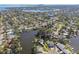 Expansive aerial view of a waterfront community with mature trees and beautiful waterways at 1516 Massachusetts Ne Ave, St Petersburg, FL 33703
