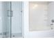 Modern bathroom with a glass-enclosed shower and a separate bathtub at 1705 Bonita Bluff Ct, Ruskin, FL 33570