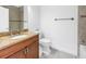 Bathroom featuring a single vanity, toilet, and towel bar at 17821 Gulf Blvd # B, Redington Shores, FL 33708