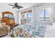 Bedroom with waterfront views and a decorative quilt at 17821 Gulf Blvd # B, Redington Shores, FL 33708