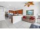 Open-concept kitchen with granite countertops, seating, and stainless steel appliances at 17821 Gulf Blvd # B, Redington Shores, FL 33708