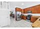 Well-equipped kitchen with stainless steel appliances, granite counters, and open layout at 17821 Gulf Blvd # B, Redington Shores, FL 33708