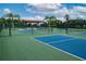 Outdoor pickleball courts with well-maintained surfaces, ideal for recreational and competitive play at 2426 Sifield Greens Way, Sun City Center, FL 33573