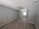 Bright bedroom featuring laminate flooring, and plenty of natural lighting at 26 Clintwood Ave, Englewood, FL 34223
