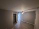Bedroom with gray walls, ceiling fan, closet, and modern vinyl flooring at 26 Clintwood Ave, Englewood, FL 34223