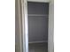 A closet with white bi-fold doors and a rod to hang your clothes at 26 Clintwood Ave, Englewood, FL 34223