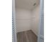 Empty closet with a single shelf and hanging rod for optimal storage at 26 Clintwood Ave, Englewood, FL 34223