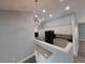 This modern kitchen features granite countertops, stainless steel appliances, and pendant lighting at 26 Clintwood Ave, Englewood, FL 34223