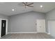 Large living room area showcasing wood-style floors and a modern ceiling fan at 26 Clintwood Ave, Englewood, FL 34223