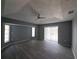 Spacious main bedroom with ceiling fan, wood-look floors and lots of natural light at 26 Clintwood Ave, Englewood, FL 34223
