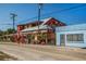 Quaint restaurant exterior with colorful decor and outdoor seating, inviting atmosphere at 26 Clintwood Ave, Englewood, FL 34223