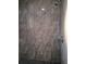 Modern shower stall with stone-like tiles, sleek fixtures, and pebble floor, creating a spa-like experience at 26 Clintwood Ave, Englewood, FL 34223