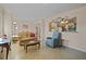 Comfortable living room with an open layout, tiled floors, and a view into the kitchen at 2850 41St N St, St Petersburg, FL 33713