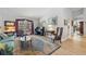 Bright living room with hardwood floors, large windows, comfortable seating, and tasteful decor at 3442 Beech Trl, Clearwater, FL 33761